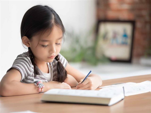 A girl writing poetry